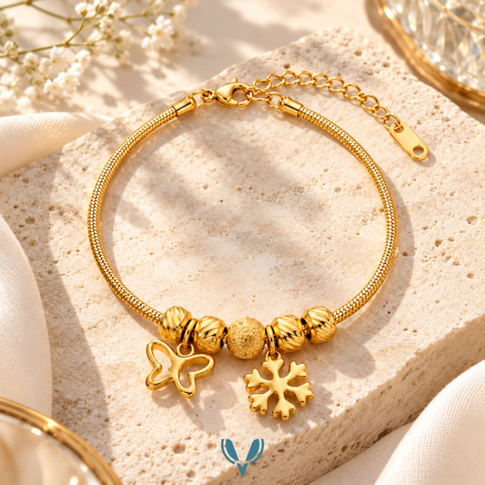 Gold Butterfly & Snowflake Charm Bracelet