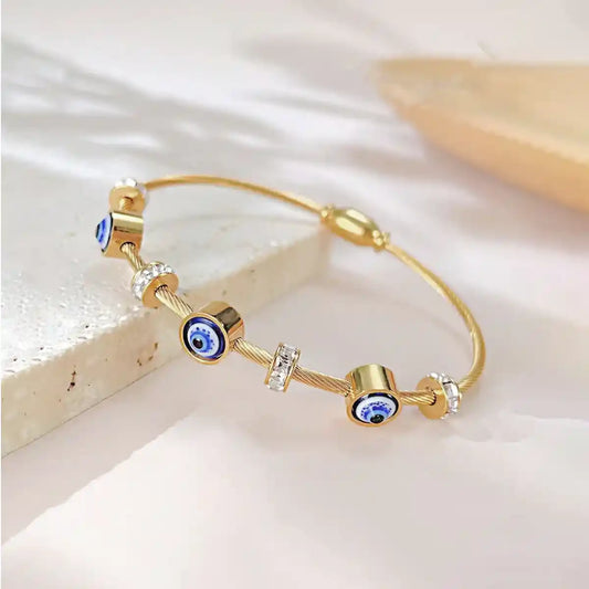 Gold cable bracelet with evil eye and cubic zirconia charms-Vellura Jewellery